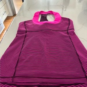 Stripped tank with built in bra. Excellent condition